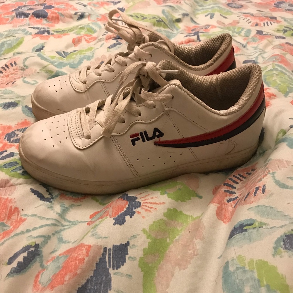 Beat up bulky fila sneakers
